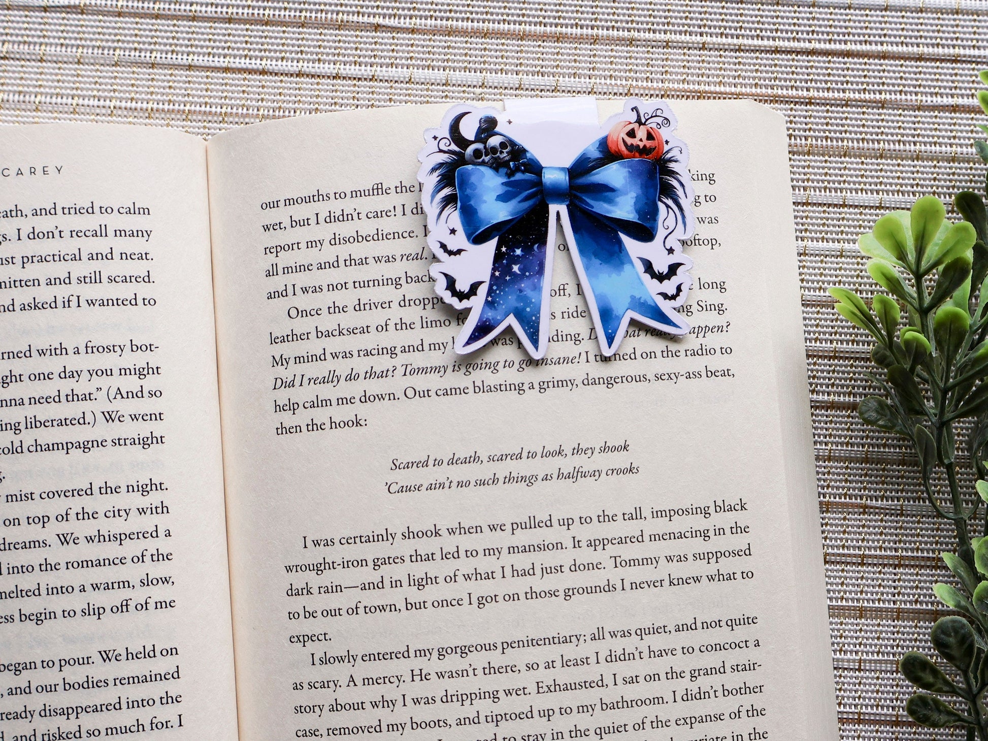 Magnetic bookmark featuring royal blue bow, pumpkin, skeletons, bats, moon